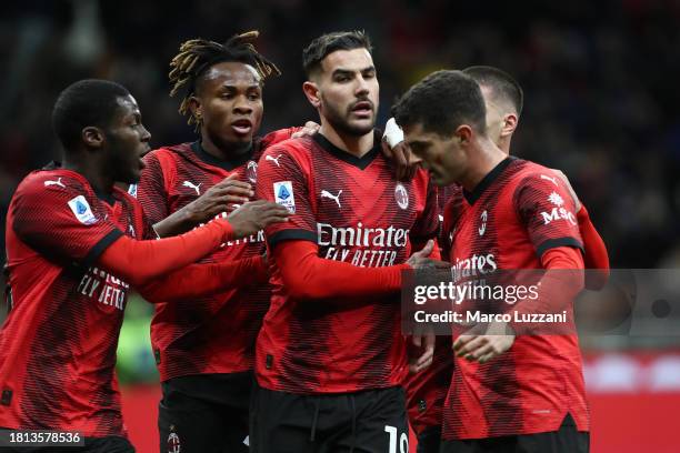 Theo Hernandez of AC Milan celebrates with teammates after scoring the team's first goal during the Serie A TIM match between AC Milan and ACF...