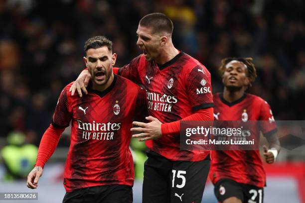 Theo Hernandez of AC Milan celebrates with teammate Luka Jovic after scoring the team's first goal during the Serie A TIM match between AC Milan and...