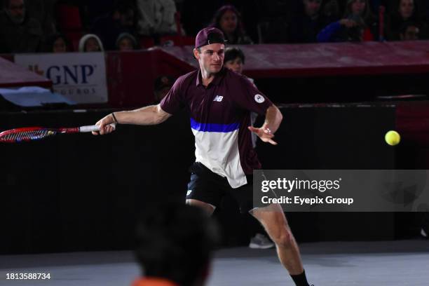 November 29 Mexico City, Mexico: Tommy Paul of USA plays a backhand against Carlos Alcaraz of Spain during the Men's single match of Tennisfest GNP...