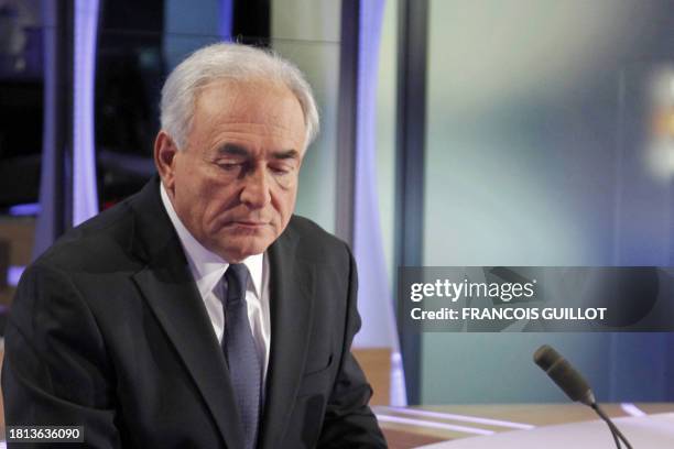 Former International Monetary Fund chief, French Dominique Strauss-Kahn answers questions by French journalist Claire Chazal during the TV news...