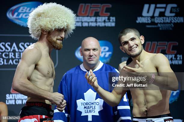 Pat Healy and Khabib Nurmagomedov face off during the UFC 165 weigh-in at the Maple Leaf Square on September 20, 2013 in Toronto, Ontario, Canada.