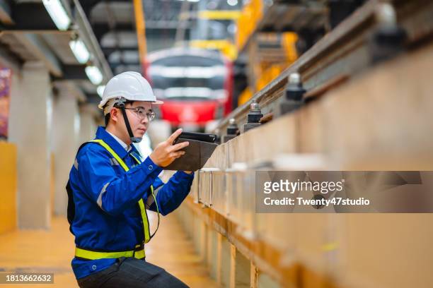 railway engineer checking safety and maintainance in the factory - train driver stock pictures, royalty-free photos & images