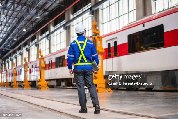 railway engineer checking safety and maintainance in the factory - train engineer stock pictures, royalty-free photos & images