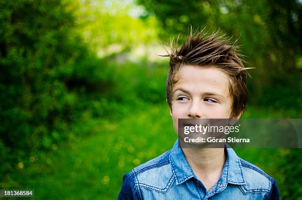 boy outside - spiky hair stock pictures, royalty-free photos & images