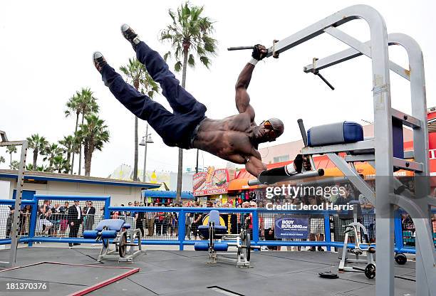 Body builders attend a special body building experience hosted by Arnold Schwarzenegger at the famed Muscle Beach Venice to celebrate the launch of...