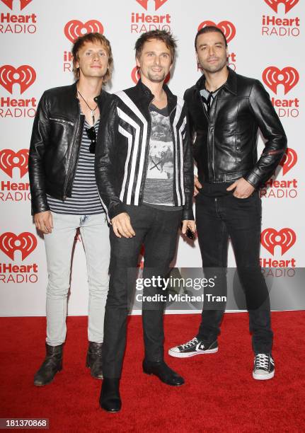 Dominic Howard, Matt Bellamy and Christopher Wolstenholme of Muse arrive at the iHeartRadio Music Festival - press room held at MGM Grand Arena on...