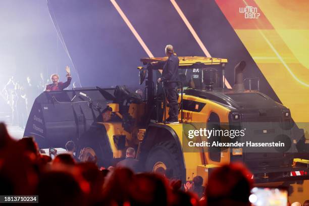 Thomas Gottschalk rides a excavator for his farewell during the "Wetten, Dass ...?" tv show on November 25, 2023 in Offenburg, Germany.