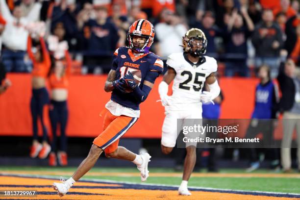 Umari Hatcher of the Syracuse Orange scores a touchdown during the fourth quarter against the Wake Forest Demon Deacons at JMA Wireless Dome on...