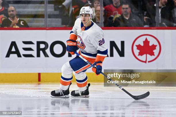 Alexander Romanov of the New York Islanders skates during the third period against the Ottawa Senators at Canadian Tire Centre on November 24, 2023...