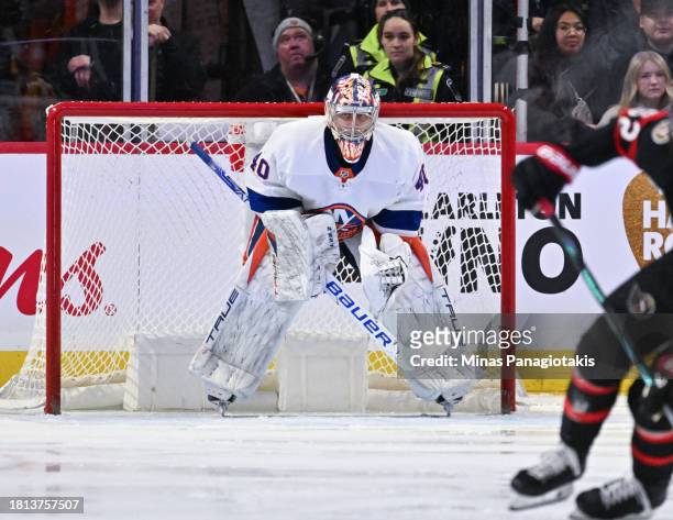 Semyon Varlamov of the New York Islanders tends the net during the third period against the Ottawa Senators at Canadian Tire Centre on November 24,...