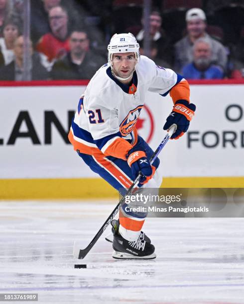 Kyle Palmieri of the New York Islanders skates the puck during the third period against the Ottawa Senators at Canadian Tire Centre on November 24,...