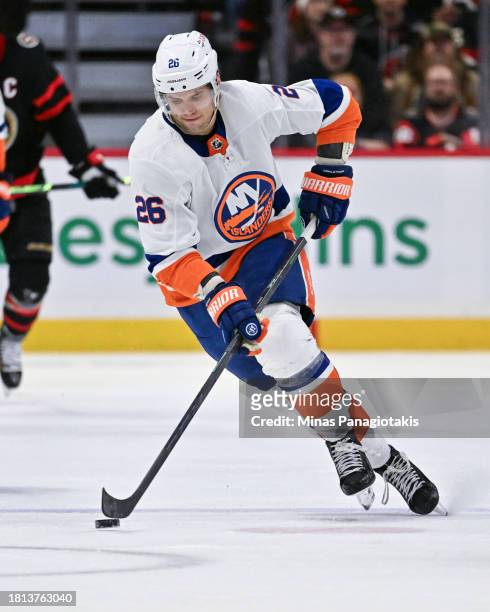 Oliver Wahlstrom of the New York Islanders skates the puck during the third period against the Ottawa Senators at Canadian Tire Centre on November...