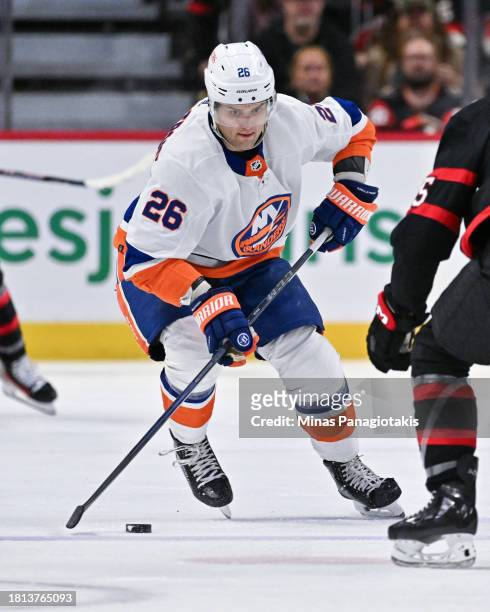 Oliver Wahlstrom of the New York Islanders skates the puck during the third period against the Ottawa Senators at Canadian Tire Centre on November...
