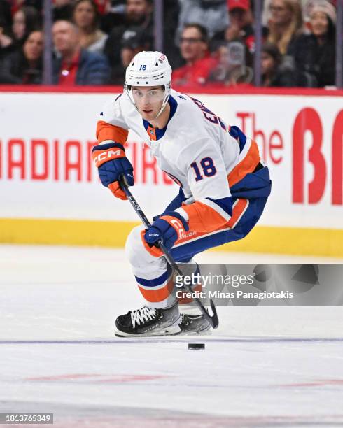 Pierre Engvall of the New York Islanders skates the puck during the third period against the Ottawa Senators at Canadian Tire Centre on November 24,...