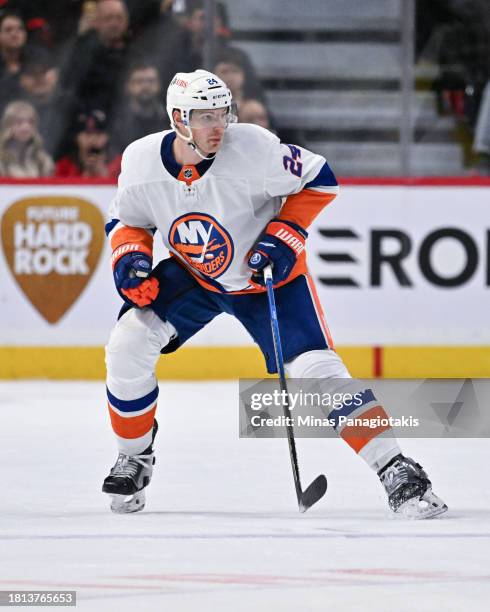 Scott Mayfield of the New York Islanders skates during the third period against the Ottawa Senators at Canadian Tire Centre on November 24, 2023 in...