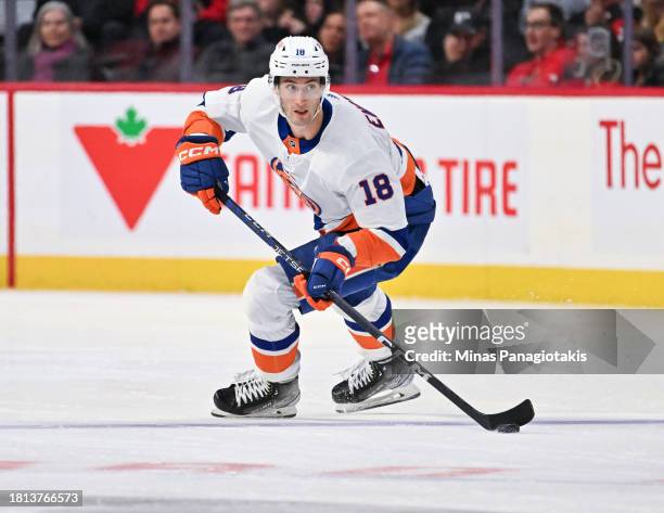 Pierre Engvall of the New York Islanders skates the puck during the third period against the Ottawa Senators at Canadian Tire Centre on November 24,...