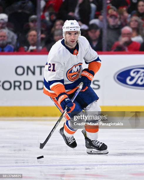 Kyle Palmieri of the New York Islanders skates the puck during the third period against the Ottawa Senators at Canadian Tire Centre on November 24,...