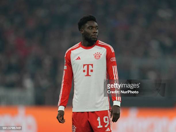 Alphonso Davies of FC Bayern Munchen is looking on during a Group A - UEFA Champions League game between Bayern Munich and FC Copenhagen at Allianz...