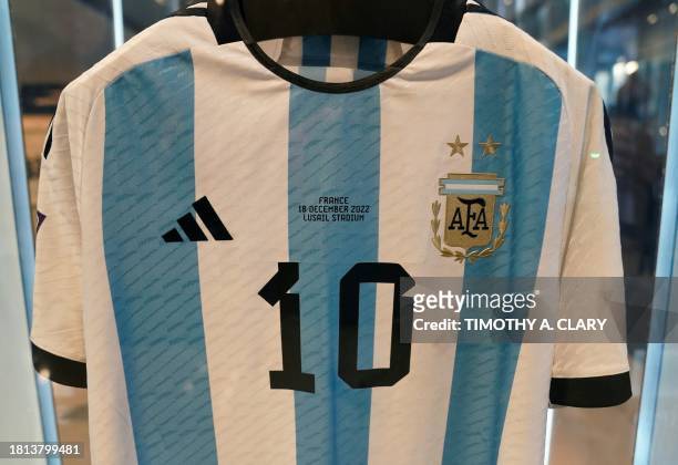 The shirt worn in the 2022 World Cup final match between Argentina and France on December 18 is displayed during a Sotheby's auction media preview of...