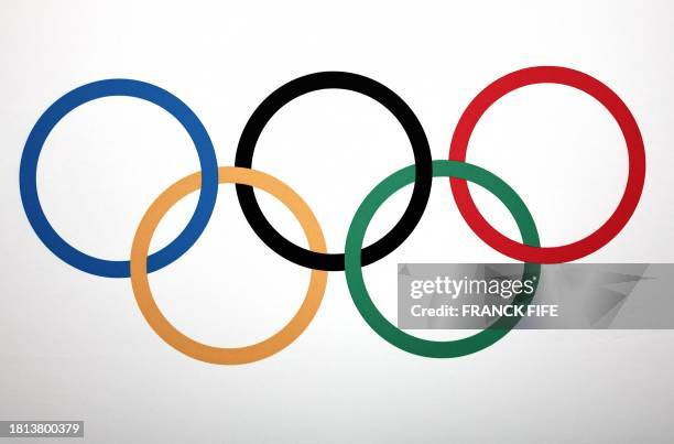 Photo shows the Olympic rings logo during a press conference after an International Olympic Committee Executive Board committee meeting in Paris, on...