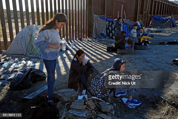 November 29: Migrants attempting to cross in to the U.S. From Mexico stay in a makeshift encampment at the border November 29, 2023 in Jacumba Hot...