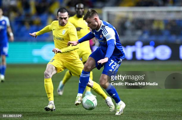 Gabriel Vidovic of Dinamo Zagreb and Varazdat Haroyan of Astana in action during UEFA Europa Conference League group stage match between FC Astana...