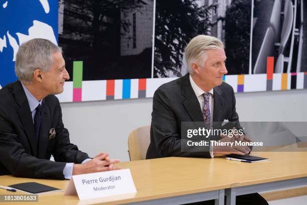 President of the Board of Directors of the Université libre de Bruxelles Pierre Gurdjian and the King Philippe of Belgium chair a meeting on the...