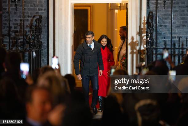 Britain's Prime Minister, Rishi Sunak, and his wife Akshata Murty prepare to switch on the Christmas tree lights in Downing Street on November 30,...