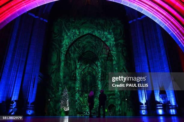 Light and sound show created by Luxmuralis, "The Light Before Christmas: The Manger" is displayed in Liverpool Cathedral on November 30, 2023 in...