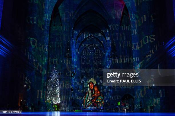 Light and sound show created by Luxmuralis, "The Light Before Christmas: The Manger" is displayed in Liverpool Cathedral on November 30, 2023 in...