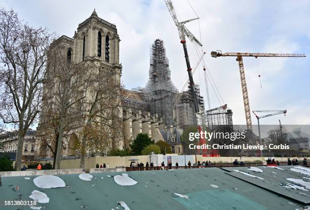 Scaffolding surrounds the structure of the new Notre Dame Cathedral spire as reconstruction work continues on November 30, 2023 in Paris, France....