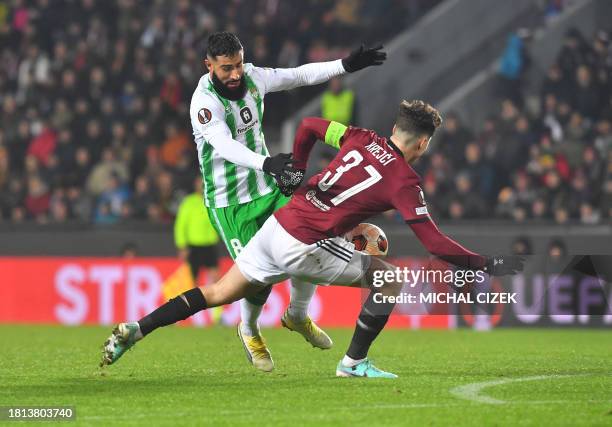 Sparta Praha's Czech midfielder Ladislav Krejci and Real Betis' French midfielder Nabil Fekir vie for the ball during the UEFA Europa League Group C...