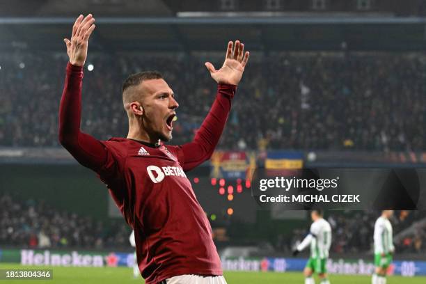 Sparta Praha's Slovak midfielder Lukas Haraslin celebrates scoring during the UEFA Europa League Group C football match between Sparta Praha and Real...