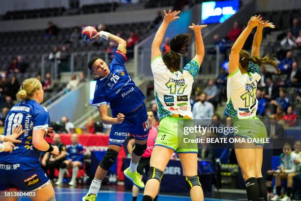 Iceland's right back Thea Imani Sturludottir jumps to shoot during the preliminary round Group D match between Slovenia and Iceland of the IHF World...