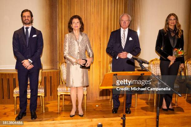 Prince Carl Philip of Sweden, Queen Silvia of Sweden, King Carl XVI Gustaf of Sweden, and Princess Madeleine of Sweden attend a concert on the...