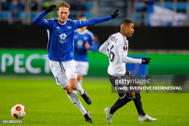 Molde's Norwegian midfielder Magnus Grodem and Garabagh's Cape Verdean midfielder Patrick Andrade vie for the ball during the UEFA Europa League...