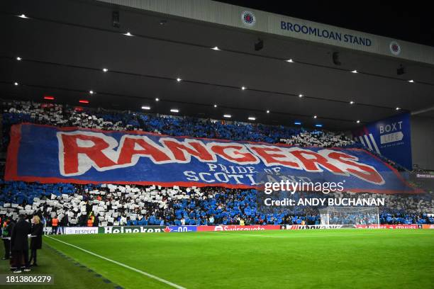 Rangers fans display a large banner in the crowd ahead of the UEFA Europa League group C football match between Rangers and Aris Limassol at the...