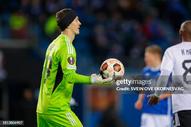 Garabagh's Russian goalkeeper Andrey Lunev holds the ball during the UEFA Europa League Group H football match between Molde FK and Qarabag FK in...