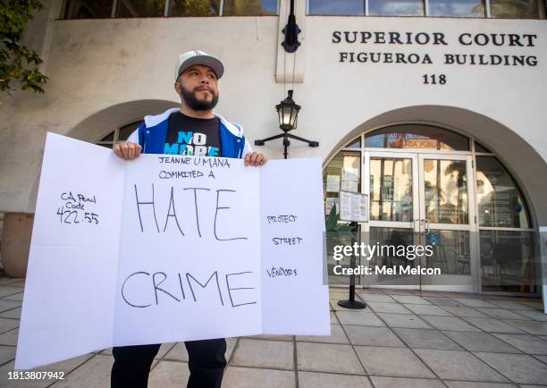 Activist Edin Alex Enamorado, protests outside of Santa Barbara Superior Court during the arraignment for Jeanne Umana, a woman caught on two...