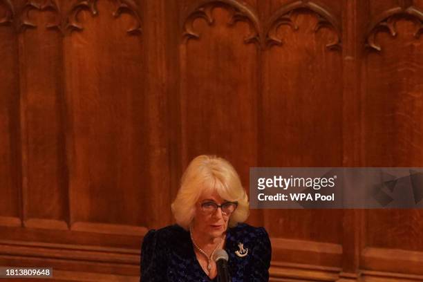 Queen Camilla delivers a speech during the Biennial RIFLES Awards Dinner at the City of London Guildhall on November 30, 2023 in London, England.