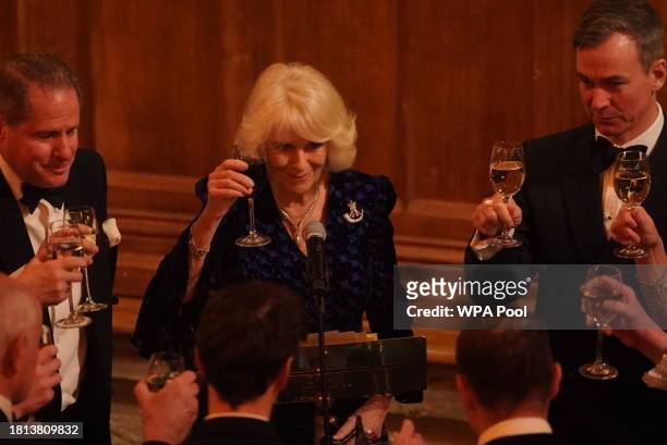 Queen Camilla attends the Biennial RIFLES Awards Dinner at the City of London Guildhall on November 30, 2023 in London, England.