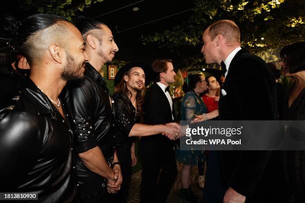 Prince William, Prince of Wales speaks with performers during the Royal Variety Performance at the Royal Albert Hall on November 30, 2023 in London,...