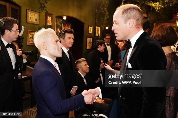 Prince William, Prince of Wales talking to a person during the Royal Variety Performance at the Royal Albert Hall on November 30, 2023 in London,...