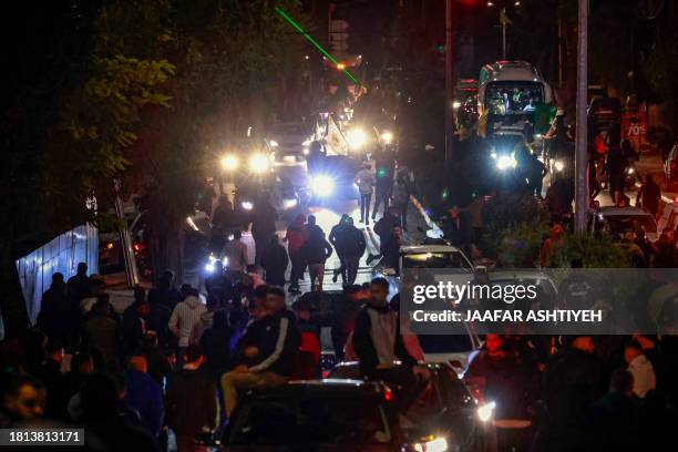 Red Cross bus arrives amid supporters during a welcome ceremony following the release of Palestinian prisoners from Israeli jails in exchange for...