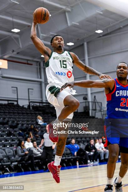 Elijah Hughes of the Wisconsin Herd dunks the ball during the second quarter on November 30, 2023 at Wayne State Fieldhouse in Detroit, Michigan....