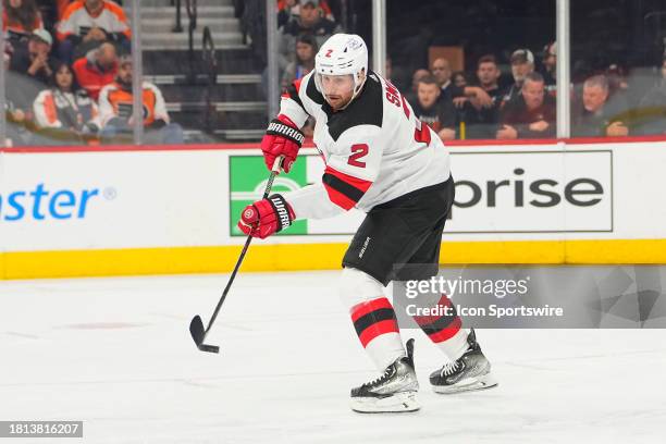 New Jersey Devils Defenseman Brendan Smith passes the puckduring the second period of the National Hockey League game between the New Jersey Devils...