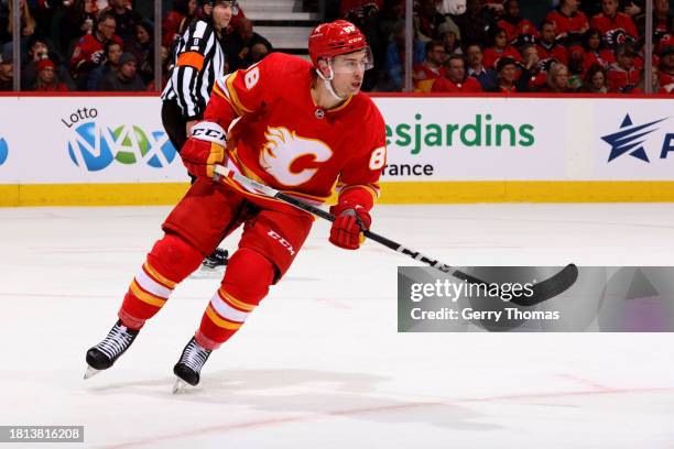 Andrew Mangiapane of the Calgary Flames skates against the Dallas Stars at Scotiabank Saddledome on November 30, 2023 in Calgary, Alberta, Canada.