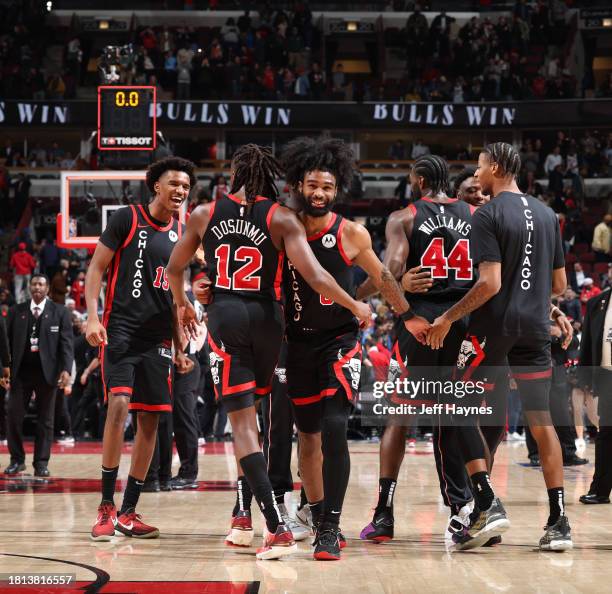 Coby White of the Chicago Bulls smiles after the game against the Milwaukee Bucks on November 30, 2023 at United Center in Chicago, Illinois. NOTE TO...