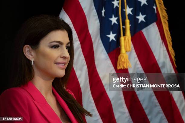 Casey DeSantis watches her husband Florida Governor and Republican presidential hopeful Ron DeSantis speak in the spin room following a debate held...