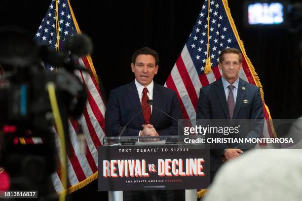 Florida Governor and Republican presidential hopeful Ron DeSantis speaks in the spin room following a debate held by Fox News, in Alpharetta,...